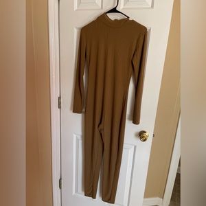 Tan one piece body suit